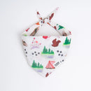 Dog bandana with forest, squirrel, tent, and paw print design for pets